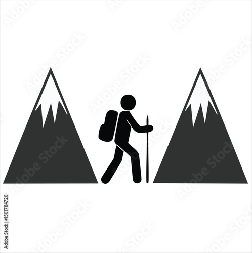 Hiker trekking between majestic mountain peaks