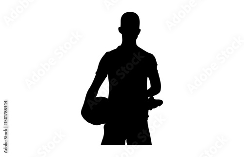 A football player is standing with a football in his hand silhouette .