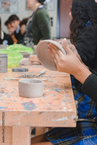 students sculpting in ceramics class 