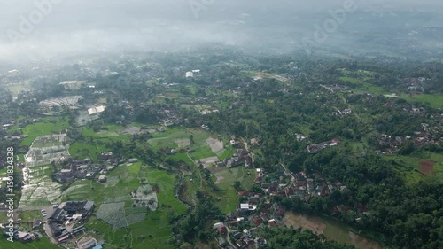 Drone 4K Aerial of Lush Highlands and Settlements

