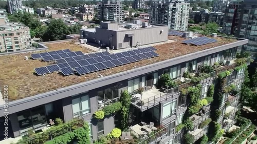 Modern Green Building Design Featuring Balcony Gardens And Solar Panels
