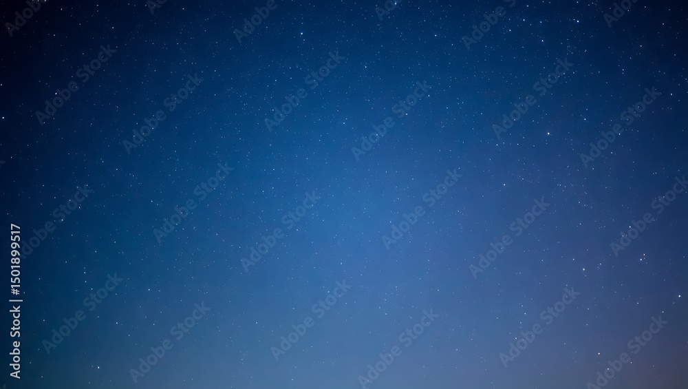 Obraz premium Beautiful night sky filled with stars in a deep blue atmospheric background