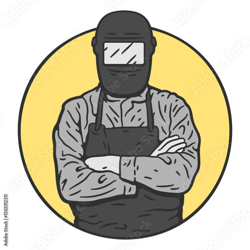 Welder in an apron with his arms crossed