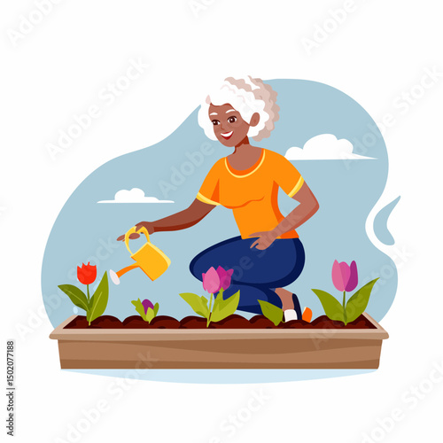 woman watering flower in flower bed