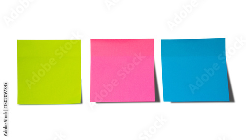 Tableau sur toile Three colorful sticky notes in green pink and blue isolated on transparent background for creative reminders or messages