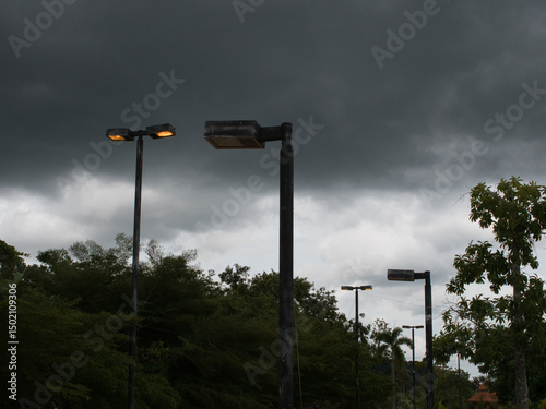 Street lights turn on automatically when there is a storm in the evening. photo