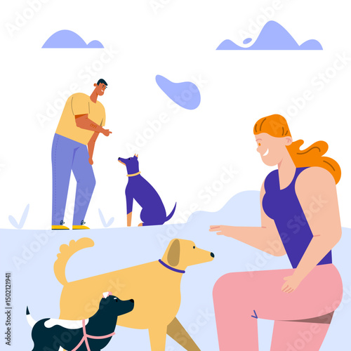 Man and woman training commands with dogs, playing with puppies