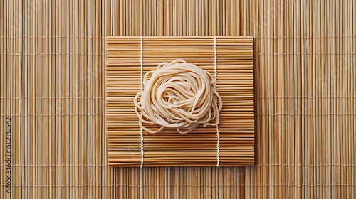 Nest of Uncooked Pasta on a Bamboo Mat