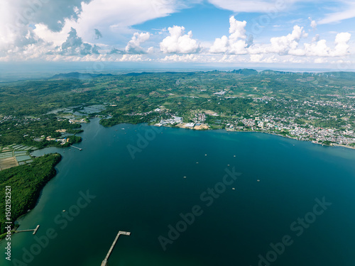 Fototapeta Naklejka Na Ścianę i Meble -  Vibrant Tropical Waterfront Community
