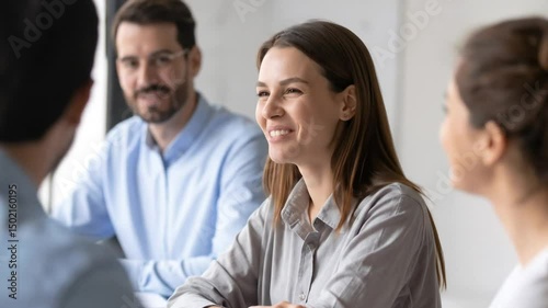 Smiling businesswoman having conversation during business meeting in the office space