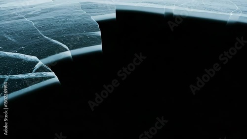 4K video, slow motion, cracked ice with intricate patterns and a subtle blue hue, ice surface shattering with alpha channel. Transparent background for motion design, VFX, winter , dramatic transition