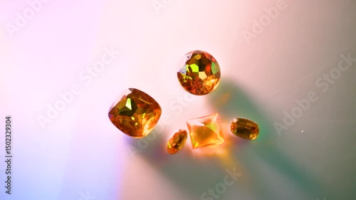 gemstones on a white table in multicolor illumination