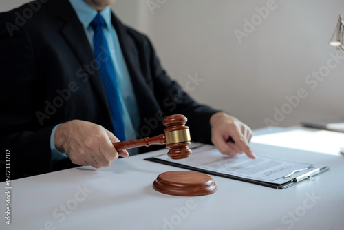 Canvastavla Judge holding a wooden gavel and pointing at a contract on a clipboard while pre