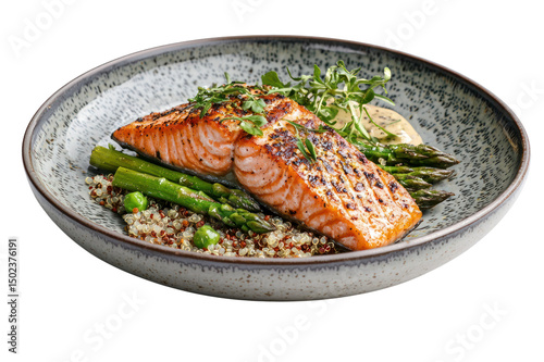 Delicious grilled salmon fillet served with fresh asparagus and herbs on a rustic ceramic plate for healthy dinner or seafood meal presentation photo