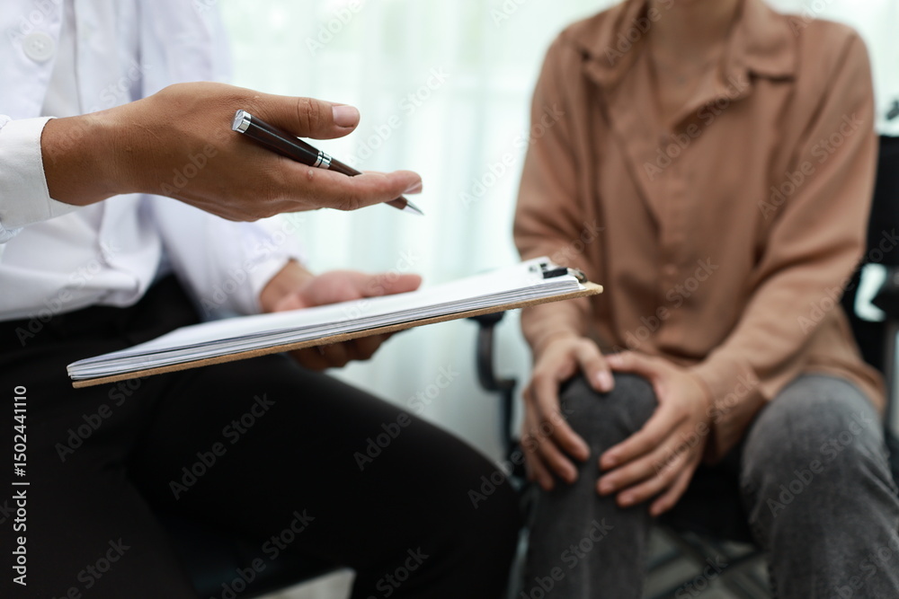 Obraz premium An elderly man sits in a wheelchair indoors, smiling with joy as a caring female nurse offers comforting support, symbolizing hope and recovery. 