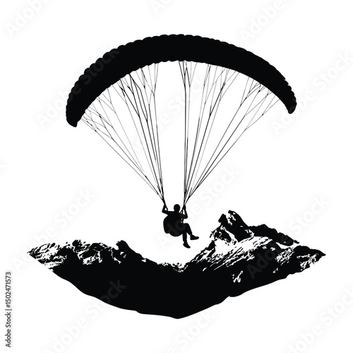 A person paragliding with a view of mountain black silhouette