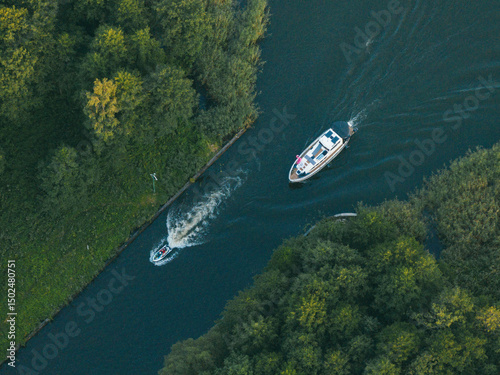 Aerial View of Two Boats Navigating River