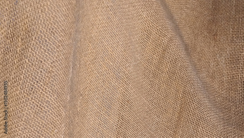 Close-up of fabric woven from burlap. The texture of an uneven crumpled, roughly woven burlap. Vector illustration.