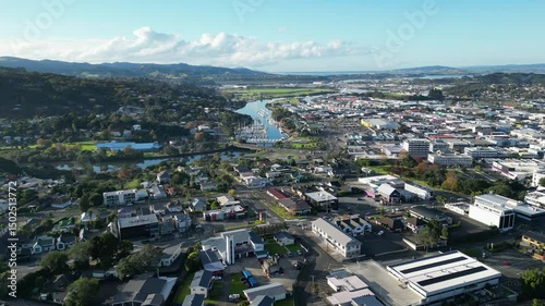 Drone view of Whangarei township with streets, boats (Town Basin) and cityscape in New Zealand.