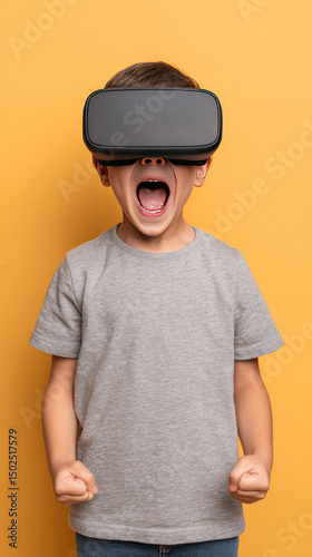 Boy wearing virtual reality headset with excited expression