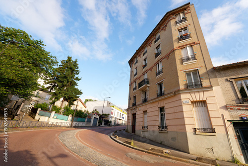 Fototapeta Naklejka Na Ścianę i Meble -  Ascending street in Paris suburb. Ivry-sur-Seine city