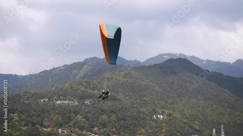 Paragliding at Bir Billing Himachal Pradesh India 2. 30 pm 10 January 2025 filmed from underneath. 4k high resolution footage.