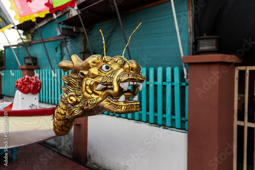 Golden dragon head sculpture on boat, Chew Jetty, Malaysia