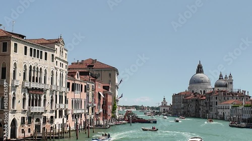 Venice, Italy - May 12, 2025 - Tourists visit the historic center of the lagoon city