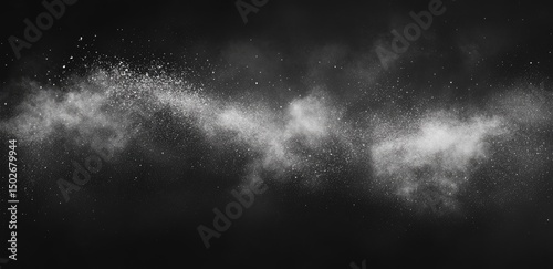 A swirling cloud of white dust against a dark background (1)