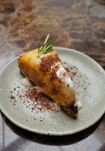 Close up shot of marshmallow and chocolate cake in dish