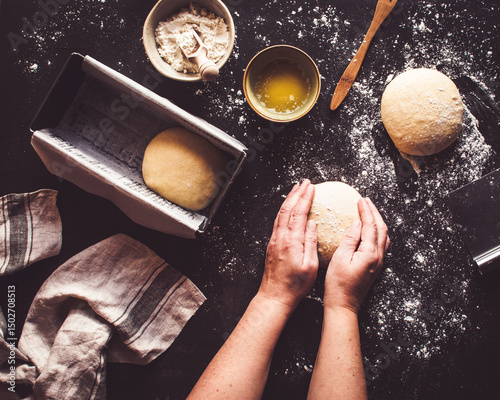 Artisan sliced bread preparation in a rustic kitchen setting