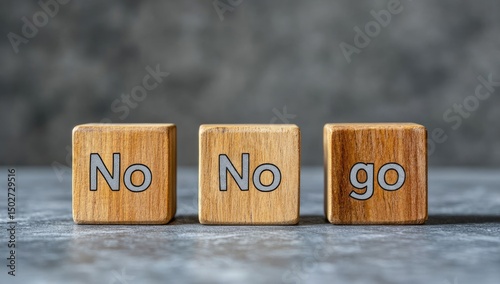 Three wooden blocks, each inscribed with 
