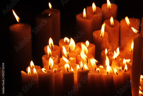 Lighting candles in chapel of Our Lady from the Kamenita vrata (Stone Gate) in Zagreb to remember and honor the deceased loved ones