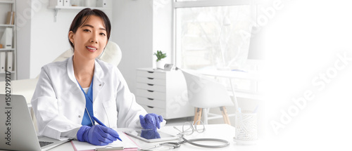 Female Asian doctor working...