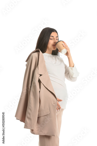 Pregnant businesswoman drin...