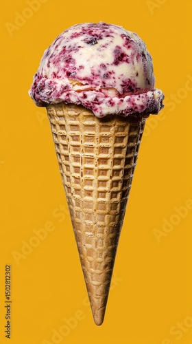 Waffle Ice Cream Cone with Creamy Berry Swirls on Yellow Studio Background
