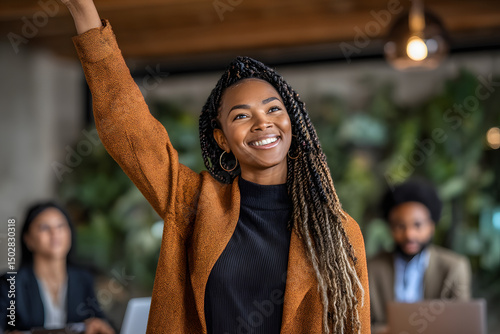 Smiling african Woman Raising Hand, Asking Question, Participation in Seminar with Audience, Conference, Workshop, Presentation, Attentive Adult Female