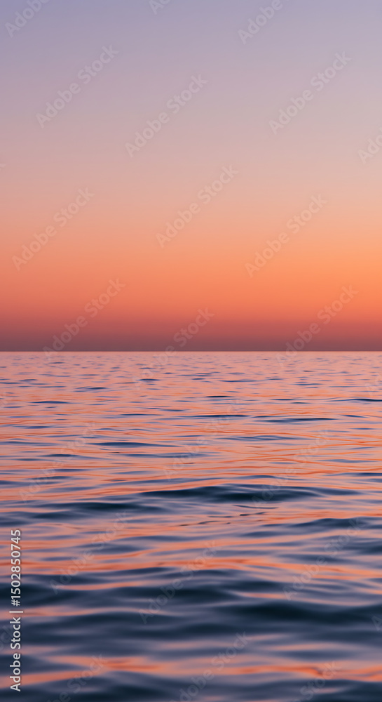 Fototapeta premium Serene Sunset Ocean Waves Calm Sea at Dusk Pink and Orange Sky
