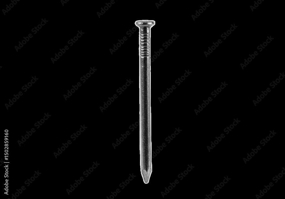 Metal nail isolated on black background, a construction hardware tool Metal nail isolated on black background, a construction hardware tool