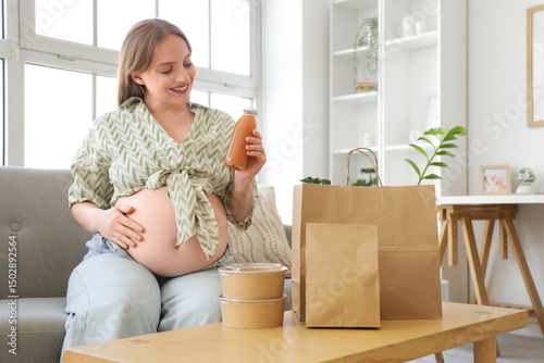 Young pregnant woman with j...