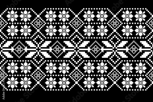Geometric pixelated Arabic patterns on the fabric reflect the ornate and ethnicity,grid floral,grid colourful, backgrounds, seamless grid design for carpet,textile,textured,wallpaper,print,decorate