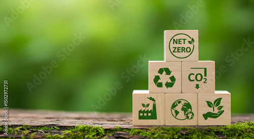 Environmental icons on wooden blocks, promoting eco-friendly action for nature