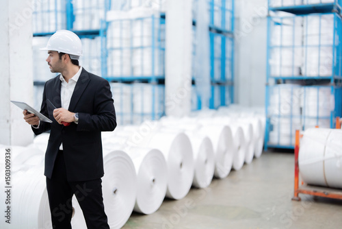 The male engineer led a project to retrofit outdated machinery in the industrial plant, making it capable of producing high-precision parts from both plastic and steel.