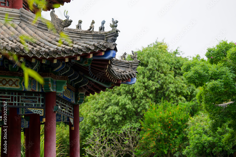 Fototapeta premium Ancient Architecture and Lush Trees Complement Each Other