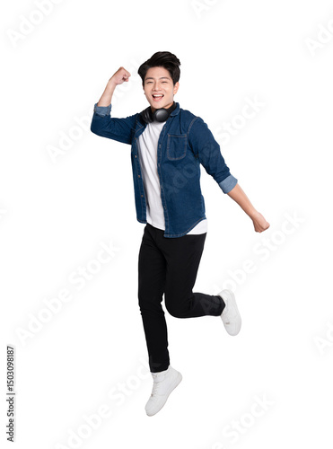 Quadro su tela Joyful Leap: A young man is captured mid-air in a moment of pure exuberance, radiating energy and joy, epitomizing the spirit of freedom and youthful vitality