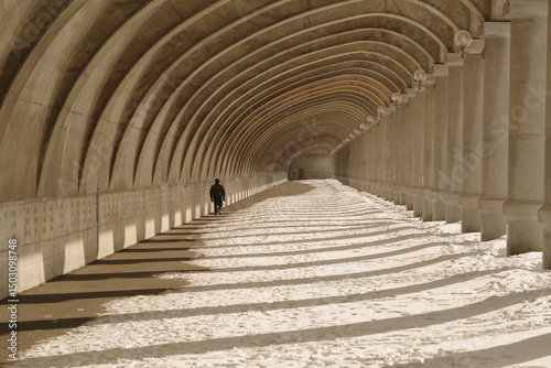 snow covered archway in soft sunlight