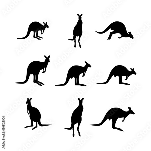 Collection of Black Kangaroo Silhouettes in Various Leaping, Standing, and Crouching Poses Representing Australian Wildlife