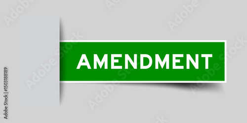Green color square shape sticker label with word amendment inserted in gray background
