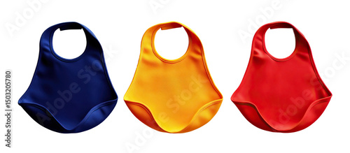Set of baby bibs - cotton bibs in bright primary colors red, yellow, and blue with simple designs photo
