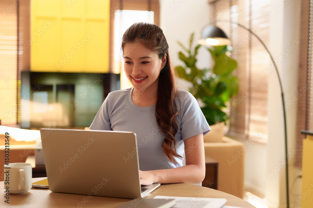 Happy Asian Woman Working on Laptop from Home Indoor Happy Asian Woman Working on Laptop from Home Indoor